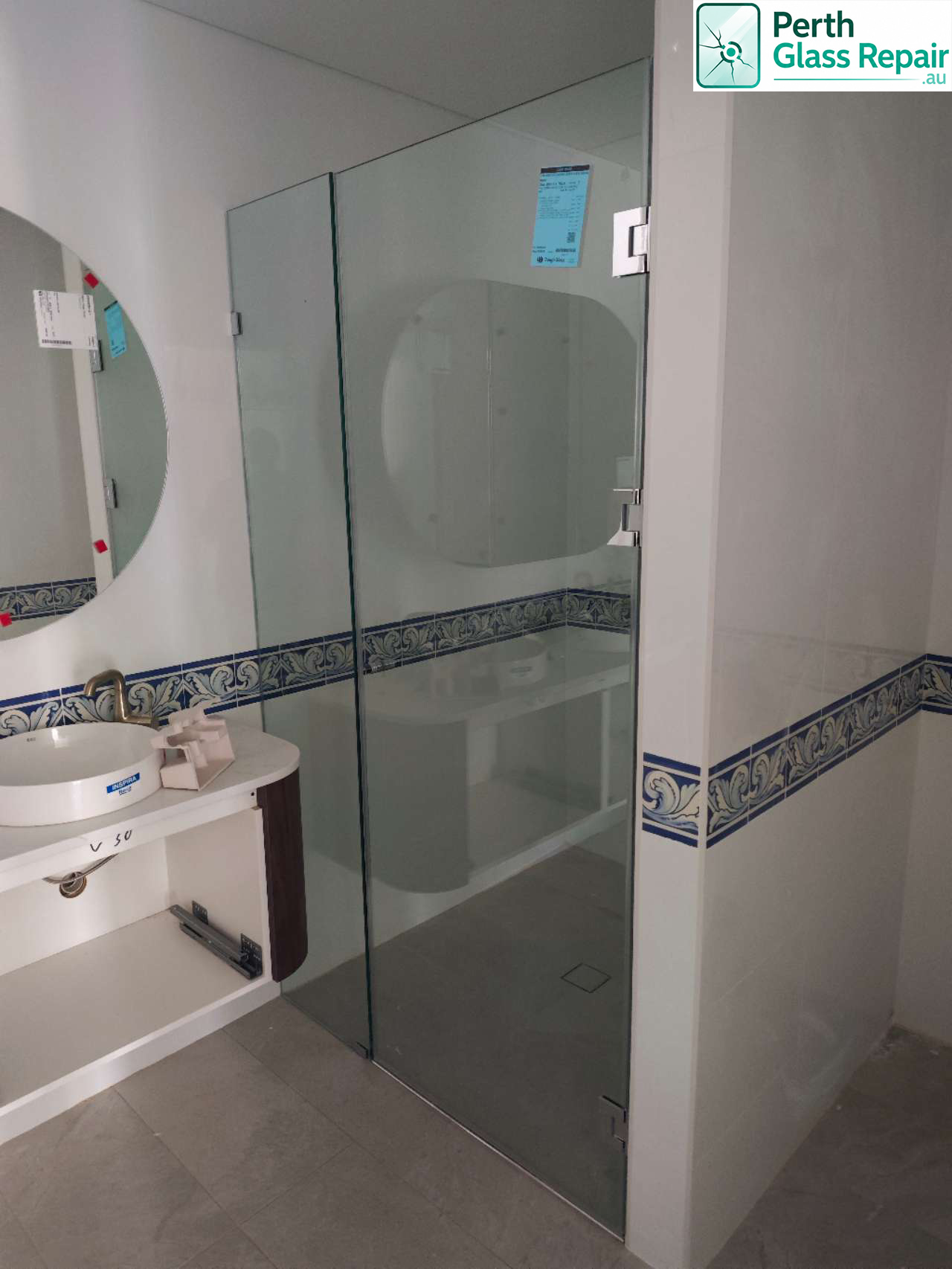 Frameless glass shower panel and door installed by Perth Glass Repair