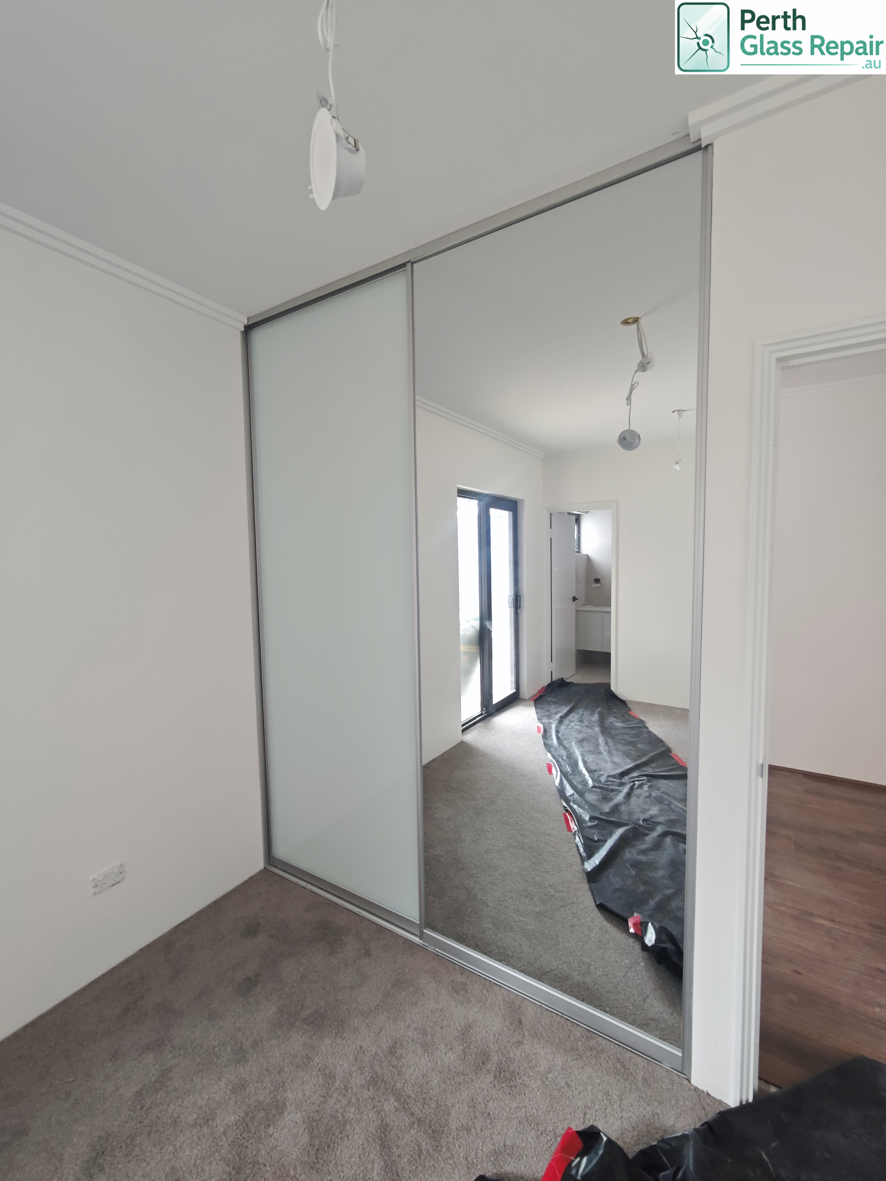 Mirrored wardrobe sliding doors installed by Perth Glass Repair